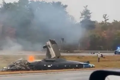Small plane crashes on I-95 during Massachusetts rush hour, killing 2