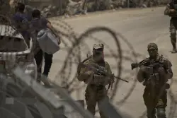 Syrian forces who fought Druze militias leave Sweida province under a ceasefire